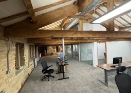 The Parallel Partnerships office when it was partially finished, there's only a couple of desks and chairs in the office.