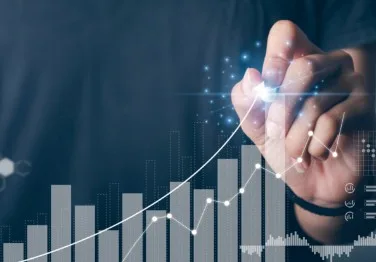 A hand drawing a graph.