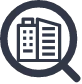 A black outline of a magnifying glass with an outline of a building within it.